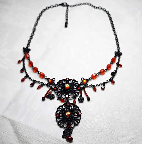 Black red filigree - &,